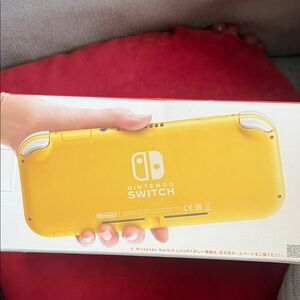 Brand new Nintendo Switch Lite Bright Yellow Handheld Console